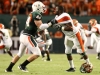 10 October 2009:  Miami (FL) linebacker Colin McCarthy (44) gets into a pushing match with Florida A&M wide receiver Kevin Elliott (5).  The No 11. Miami Hurricanes defeated Florida A & M Rattlers 48-16 at Landshark Stadium in Miami Gardens, FL.